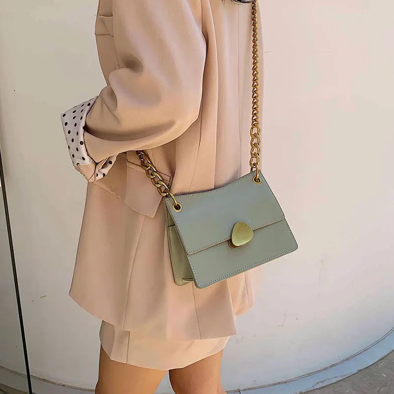 Gold Chains Women's Crossbody Bag Designer Lock Soulder Bag Simple Fashion Small Flap Bag Luxury PU Leather Messager Sac Ins Hot
Gold Chains Women's Crossbody Bag Designer Lock Soulder Bag Simple Fashion Small Flap Bag Luxury PU Leather Messager Sac Ins Hot