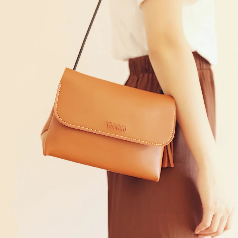 Genuine leather women's messenger bag Triangle shape cowhide multiple colors one shoulder crossbody handbag cover buttonLY-0331
Genuine leather women's messenger bag Triangle shape cowhide multiple colors one shoulder crossbody handbag cover buttonLY-0331