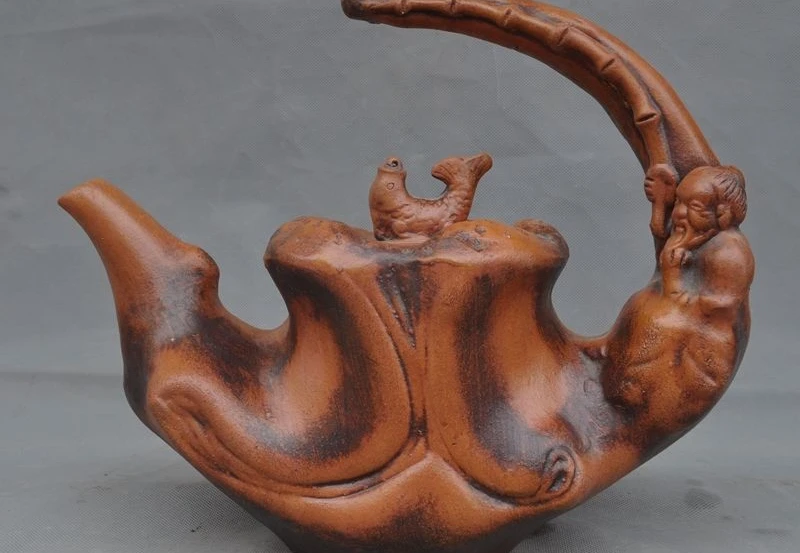 Old Chinese yixing zisha pottery Carved Fisherman Fish Statue Teapot Tea set pot
Old Chinese yixing zisha pottery Carved Fisherman Fish Statue Teapot Tea set pot