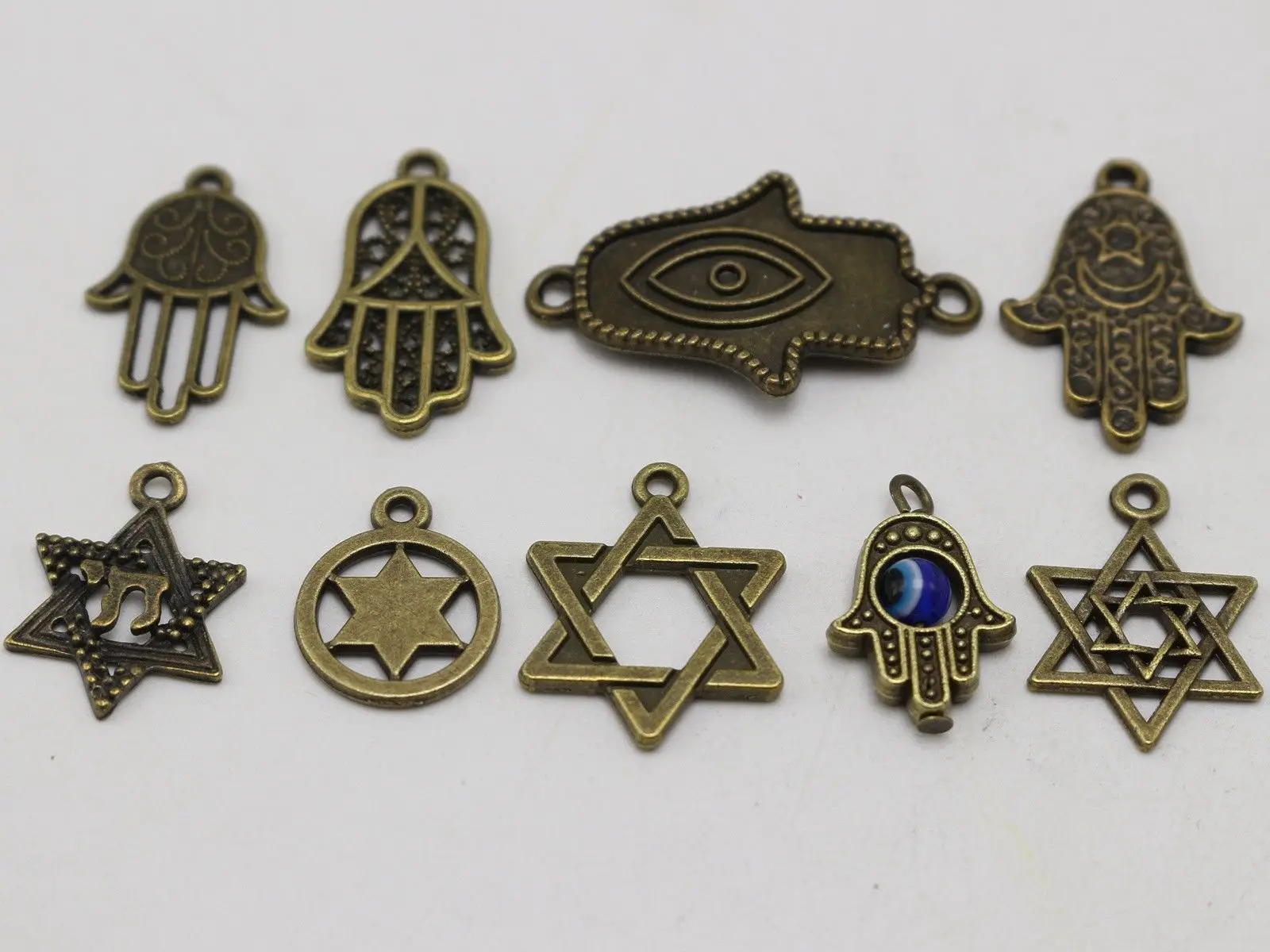 40 Assorted Bronze Kabbalah BLUE EYE Hamsa Hand "Star of David" Charm Pendants
40 Assorted Bronze Kabbalah BLUE EYE Hamsa Hand "Star of David" Charm Pendants