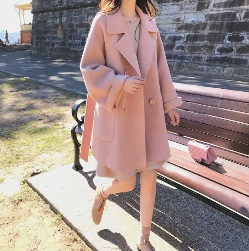 Autumn and winter lapel double-breasted belt women's long coat new double-sided Korean warm woolen jacket
Autumn and winter lapel double-breasted belt women's long coat new double-sided Korean warm woolen jacket
