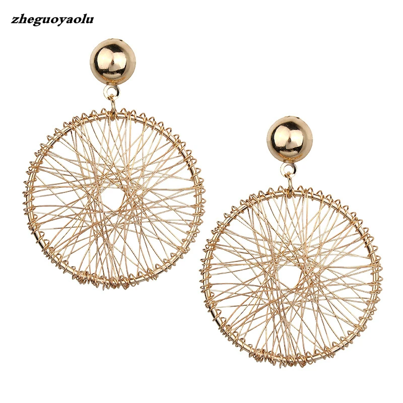 2019 Korean Version Of The Simple Design Sense Of Gold Geometric Round Thread Winding Exaggerated Pendant Earrings Women Jewelry
2019 Korean Version Of The Simple Design Sense Of Gold Geometric Round Thread Winding Exaggerated Pendant Earrings Women Jewelry