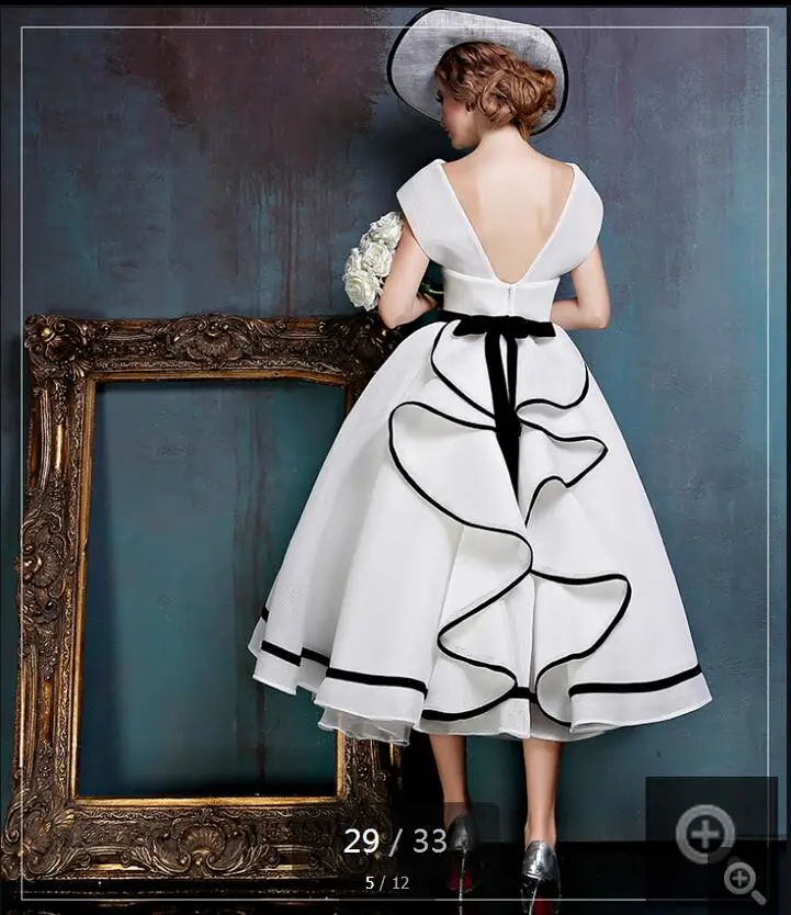 Real picture white ruffled a line lace cap sleeve wedding dresses v neckline vintage bridal gowns open back wedding gown
Real picture white ruffled a line lace cap sleeve wedding dresses v neckline vintage bridal gowns open back wedding gown