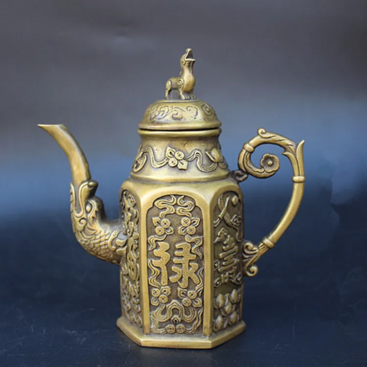Antique collection Antique Bronze Brass Teapot Fortune Dragon hand pot with a kettle pot pot of money brave.
Antique collection Antique Bronze Brass Teapot Fortune Dragon hand pot with a kettle pot pot of money brave.