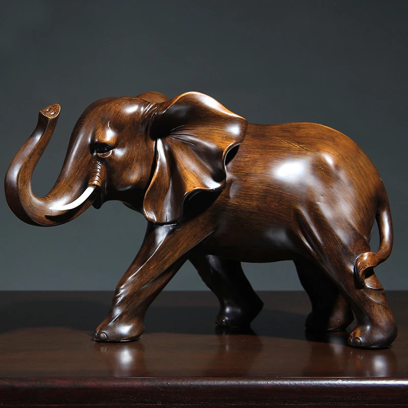 An elephant swing for wind and water Handicraft opening gift office table Sitting room de animal statue home decoration wedding
An elephant swing for wind and water Handicraft opening gift office table Sitting room de animal statue home decoration wedding