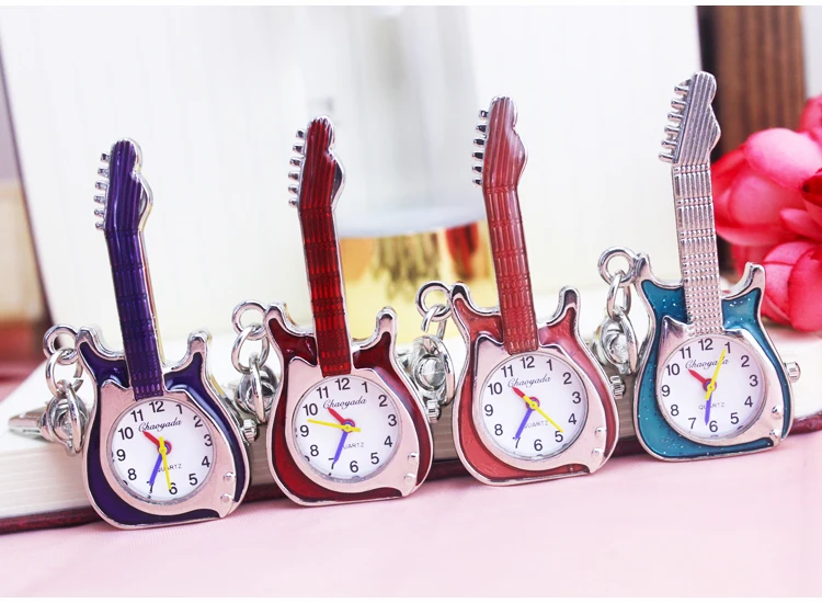 Men's and women's watches and clocks casual guitar design female girl quartz watch pendant pocket watch creative keychain watch
Men's and women's watches and clocks casual guitar design female girl quartz watch pendant pocket watch creative keychain watch