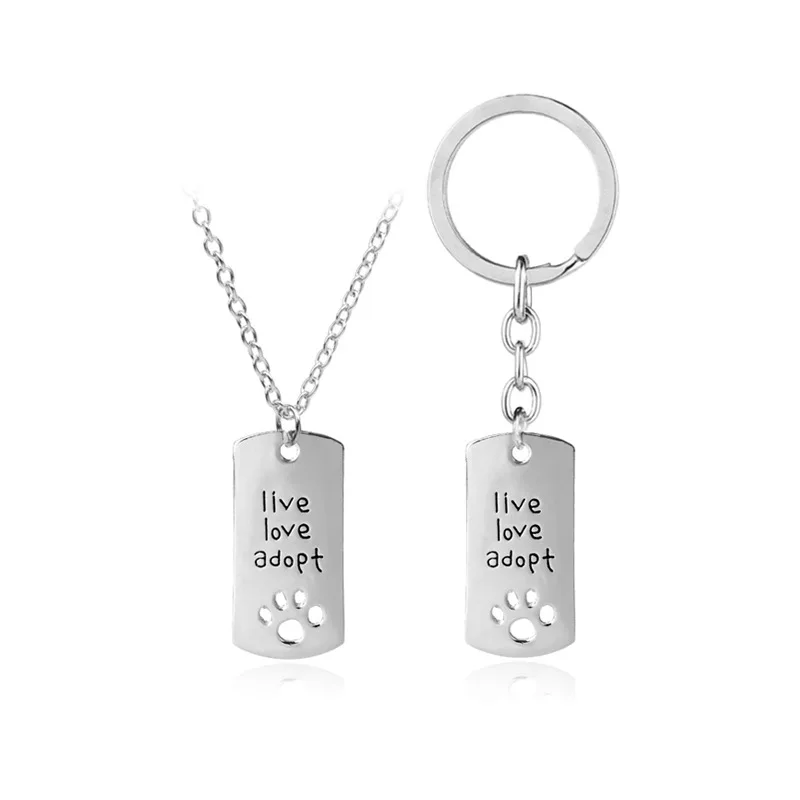Fashion Rectangular Dog Tag Pendants " live love adopt " Pet Rescue Paw Print Tag Keychain Alloy Key Rings Wholesale 12pcs/lot
Fashion Rectangular Dog Tag Pendants " live love adopt " Pet Rescue Paw Print Tag Keychain Alloy Key Rings Wholesale 12pcs/lot