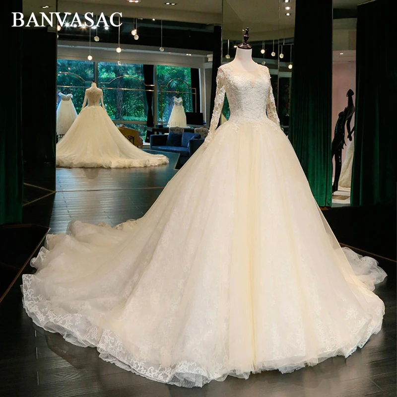 BANVASAC 2018 Real Photos O Neck Ball Gown Wedding Dresses Embroidery Long Sleeve Lace Chapel Train Bridal Dresses
BANVASAC 2018 Real Photos O Neck Ball Gown Wedding Dresses Embroidery Long Sleeve Lace Chapel Train Bridal Dresses