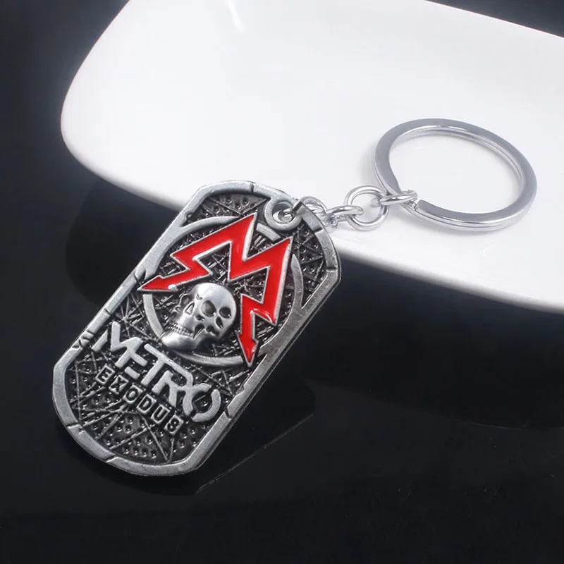 SG New Game Metro Exodus 2033 Keychains Vintage Souvenir Dog Tag Pendant Metal Keyring Men Charms Gifts Llavero Jewelry
SG New Game Metro Exodus 2033 Keychains Vintage Souvenir Dog Tag Pendant Metal Keyring Men Charms Gifts Llavero Jewelry