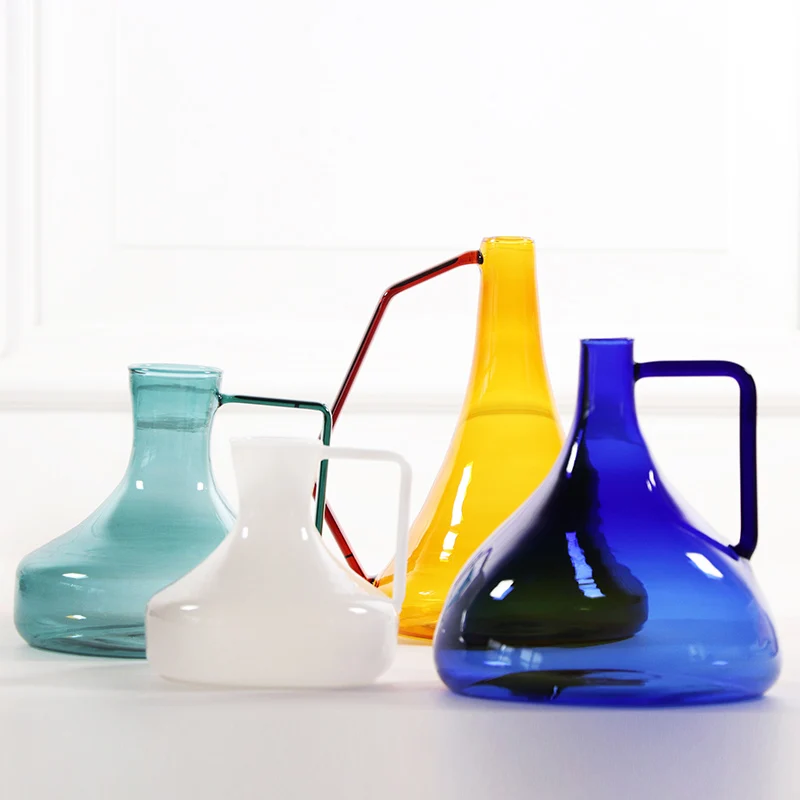 Nordic simple color glass water bottle narrow mouth creative vase flower multi-purpose glass bottle decorative ornaments
Nordic simple color glass water bottle narrow mouth creative vase flower multi-purpose glass bottle decorative ornaments