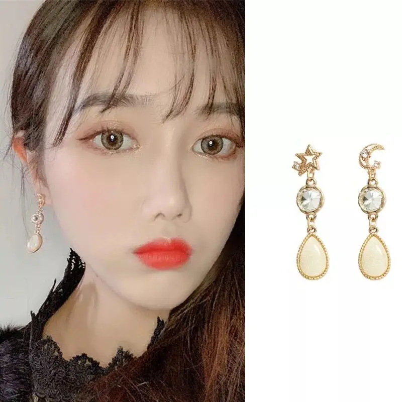 2019 New Asymmetric Rhinestone Hollow Star Moon Pendientes Long Water Drop Crystal Pendant Earrings Jewelry For Women EC1527
2019 New Asymmetric Rhinestone Hollow Star Moon Pendientes Long Water Drop Crystal Pendant Earrings Jewelry For Women EC1527