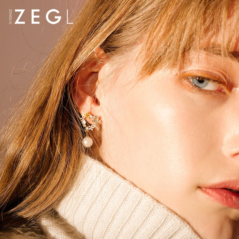 ZEGL 2018 new flower earrings female petals imitation pearl earrings short small fresh literary earrings
ZEGL 2018 new flower earrings female petals imitation pearl earrings short small fresh literary earrings