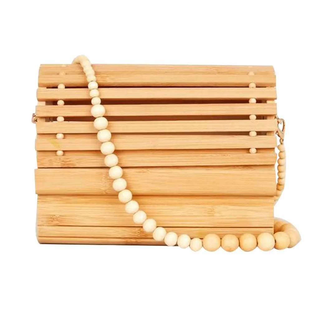 Summer Beach Lady Hollow Bamboo Weaving Shoulder Crossbody Bag with Beaded Chain
Summer Beach Lady Hollow Bamboo Weaving Shoulder Crossbody Bag with Beaded Chain