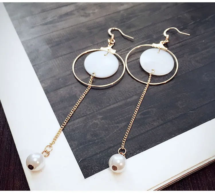 Europe And The United States New Long-chain Pendant Earrings Fashion Shell Simulation Female Personality Earrings Pearl Drop
Europe And The United States New Long-chain Pendant Earrings Fashion Shell Simulation Female Personality Earrings Pearl Drop