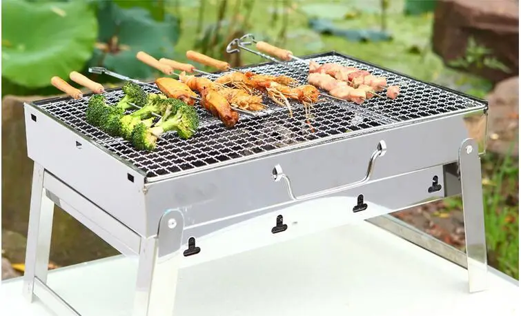 Stainless steel BBQ Grills home outdoor barbecue Portable thick folding wild charcoal barbecue tool set
Stainless steel BBQ Grills home outdoor barbecue Portable thick folding wild charcoal barbecue tool set