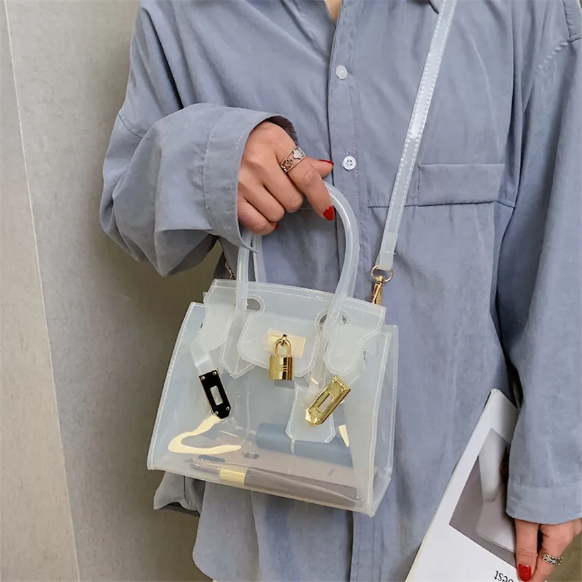 TOYOOSKY 2019 New Design Transparent Handbag Women Clear PVC Summer Beach Bag Lock Small Tote Shoulder Bag Female Crossbody Bags
TOYOOSKY 2019 New Design Transparent Handbag Women Clear PVC Summer Beach Bag Lock Small Tote Shoulder Bag Female Crossbody Bags