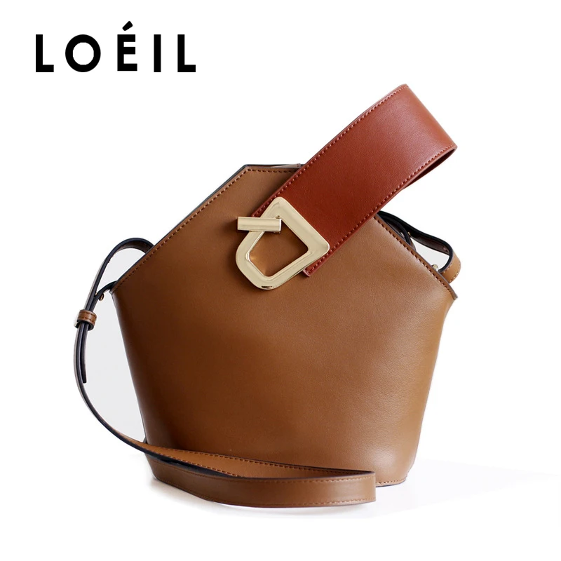 LOEIL Leather wide shoulder strap design bucket bag 2017 new simple contrast color portable diagonal female bag
LOEIL Leather wide shoulder strap design bucket bag 2017 new simple contrast color portable diagonal female bag