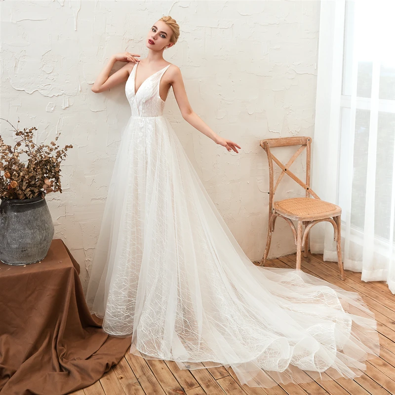 White/Ivory Boho beach Wedding Dresses 2019 V-Neck A-Line Lace Wedding Gown Long Sexy Beaded Bridal Dress Vestido de Novia
White/Ivory Boho beach Wedding Dresses 2019 V-Neck A-Line Lace Wedding Gown Long Sexy Beaded Bridal Dress Vestido de Novia