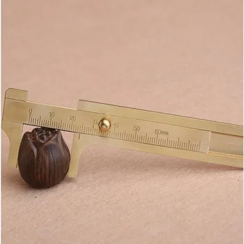 Special offer of 1pc full Copper made portable Mini dual scale solution vernier caliper for measuring jewelry jade walnut etc
Special offer of 1pc full Copper made portable Mini dual scale solution vernier caliper for measuring jewelry jade walnut etc