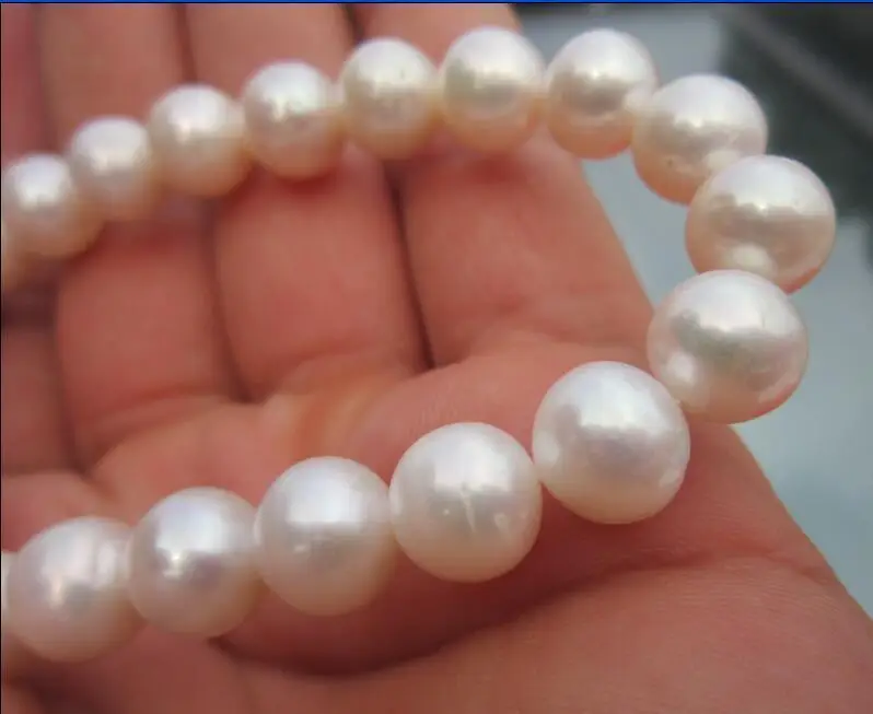 huge gorgeous AAA 12-14mm round freshwater white natural pearl necklace 18" 925silver
huge gorgeous AAA 12-14mm round freshwater white natural pearl necklace 18" 925silver