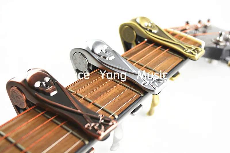 Alice A007H Metal Pirate Skull Guitar Capo Clamp For Acoustic Electric Guitar Bronze/Silver/Copper
Alice A007H Metal Pirate Skull Guitar Capo Clamp For Acoustic Electric Guitar Bronze/Silver/Copper