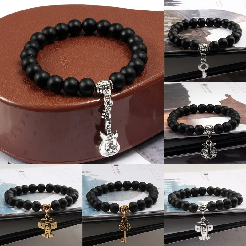 Bracelets and Bangles Personality Alloy Pendant Guitar Cross Key Aircraft owl Fashion Jewelry Accessories Men women Black Beads
Bracelets and Bangles Personality Alloy Pendant Guitar Cross Key Aircraft owl Fashion Jewelry Accessories Men women Black Beads
