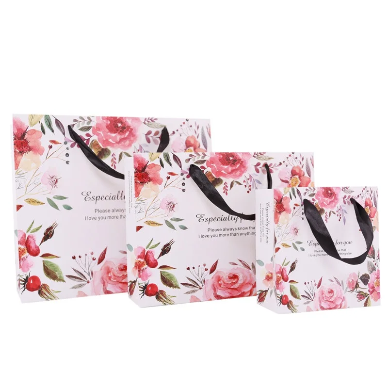100pcs/lot New design Flowers paper bag with handle Wedding Party Favor Paper Gift Bags
100pcs/lot New design Flowers paper bag with handle Wedding Party Favor Paper Gift Bags