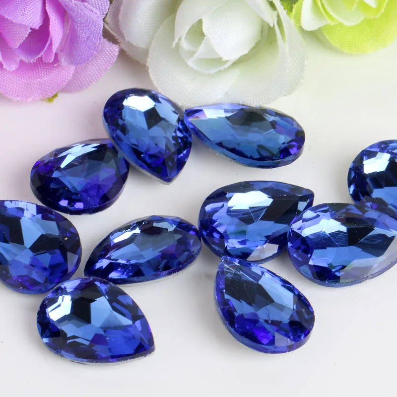Light blue Drop shaped glass crystal Pointed bottom rhinestone apply to Watch decoration and DIY Wedding dress jewelry 50pcs
Light blue Drop shaped glass crystal Pointed bottom rhinestone apply to Watch decoration and DIY Wedding dress jewelry 50pcs
