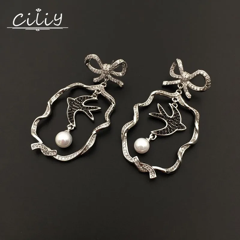 Ciliy 2018 Drop Earrings AAA Zircon Silver Needle Earings Swallow Pearl Bowknot Copper Gold Plating Women Jewelry F253235FY
Ciliy 2018 Drop Earrings AAA Zircon Silver Needle Earings Swallow Pearl Bowknot Copper Gold Plating Women Jewelry F253235FY