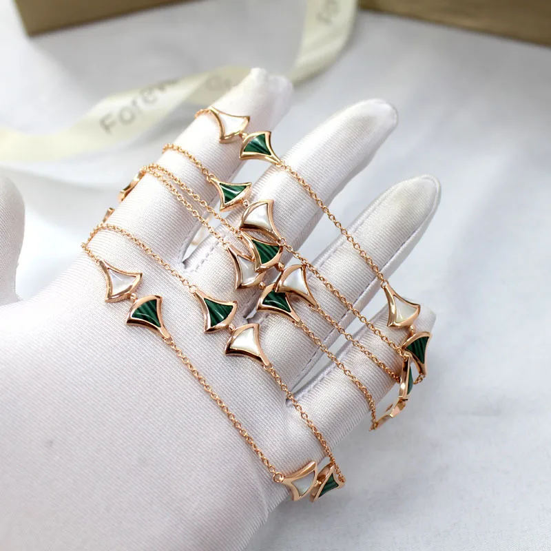 22pcs shell malachite fan charms necklace rose gold small skirt seater chain necklace long pendant 925 silver brand jewelry
22pcs shell malachite fan charms necklace rose gold small skirt seater chain necklace long pendant 925 silver brand jewelry