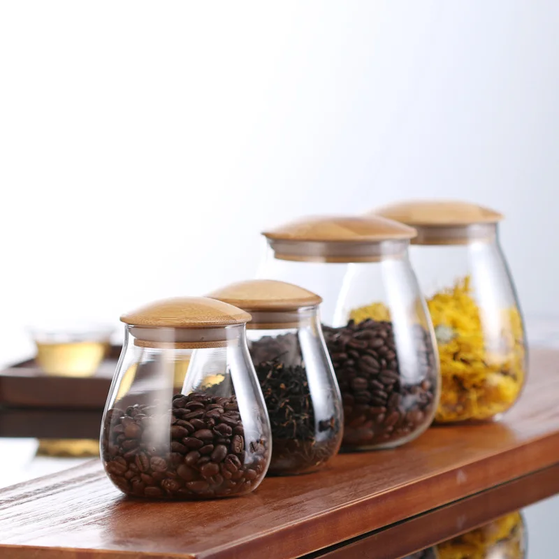 400 and 800ml high quality sealed cans Kitchen mushroom shaped glass storage tank, brief style jar Storage of tea, coffee beans
400 and 800ml high quality sealed cans Kitchen mushroom shaped glass storage tank, brief style jar Storage of tea, coffee beans