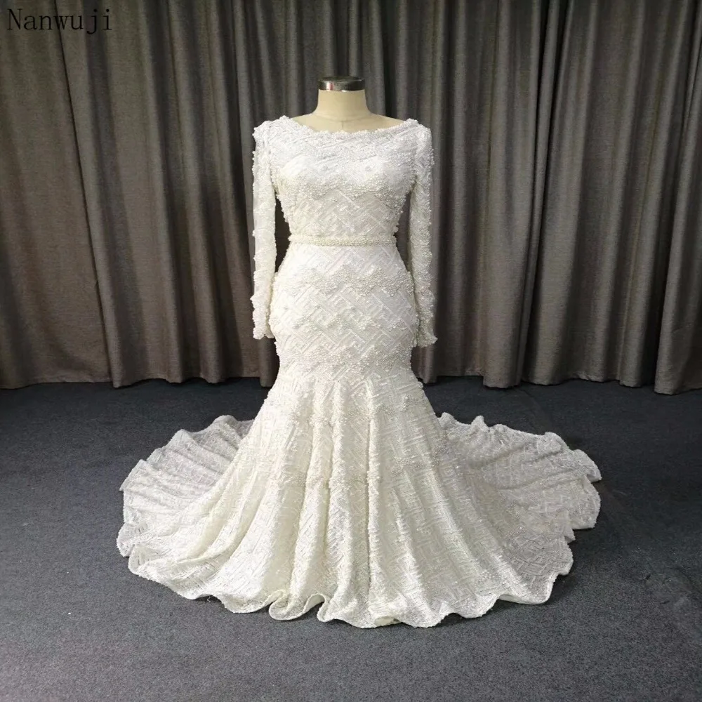 2018 High Quality Backless Mermaid Wedding Dresses Sexy Lace Appliqued Beaded Wedding Gowns With Long Sleeve Robe
2018 High Quality Backless Mermaid Wedding Dresses Sexy Lace Appliqued Beaded Wedding Gowns With Long Sleeve Robe