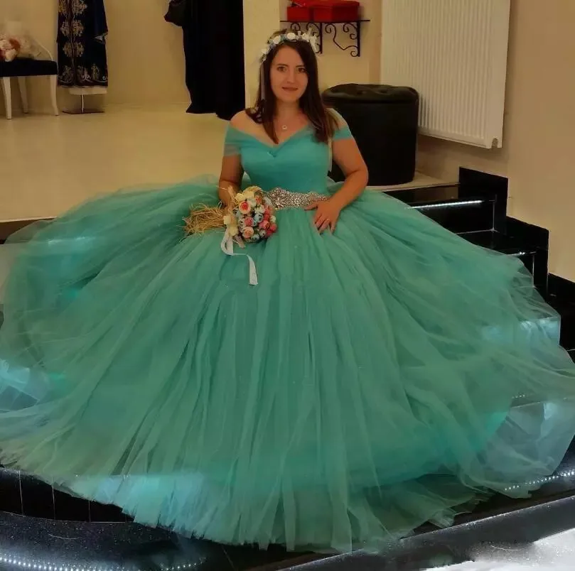 sexy-off-shoulder-2018-quinceanera-dresses-floor-length-draped-waist-shinning-beadings-debutante-dresses-turquoise-evening-prom-dresses.webp_
