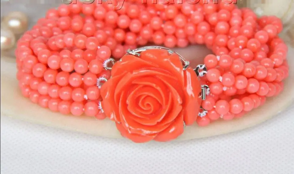 Hot sale new Style >>>>>AAA 8" 10row round pink coral beads bracelet Imitation pink coral clasp j9606
Hot sale new Style >>>>>AAA 8" 10row round pink coral beads bracelet Imitation pink coral clasp j9606