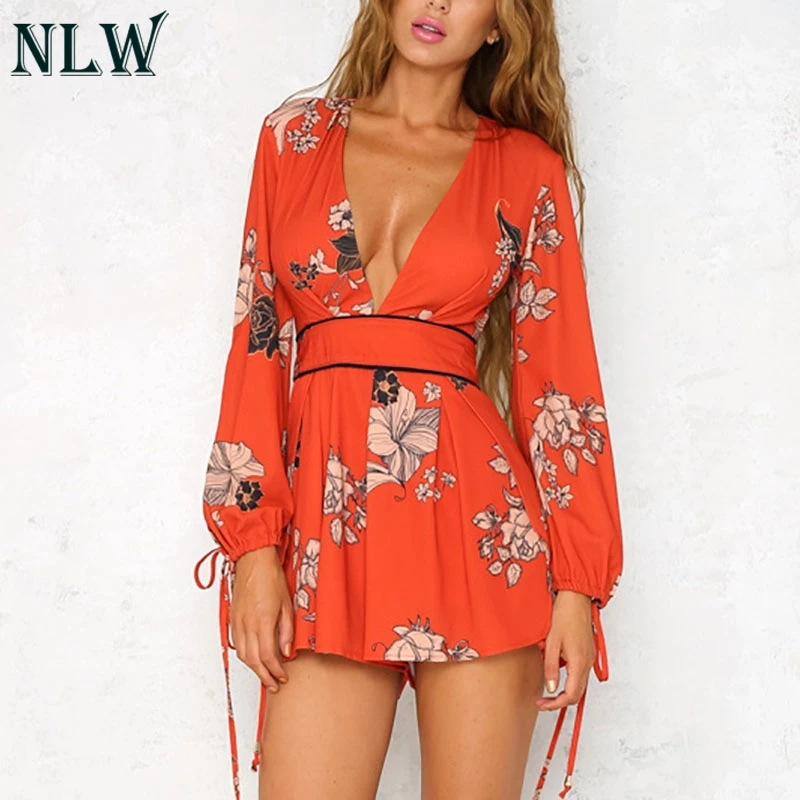 NLW Navy Blue Floral Summer Playsuit Women Boho Sexy Jumpsuit 2018 Deep V Neck Lantern Long Sleeve Chic Romper Overalls Bodysuit
NLW Navy Blue Floral Summer Playsuit Women Boho Sexy Jumpsuit 2018 Deep V Neck Lantern Long Sleeve Chic Romper Overalls Bodysuit