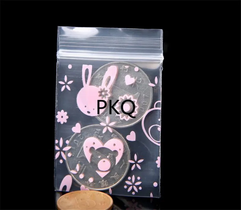 Фото 100 шт розовый кролик печати Мини молния замок ручка пластиковая сумка маленькая