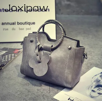 Fashion new handbags High quality PU leather Women bag Woven ring portable shoulder bag Fashion wild Mickey pendant Female bag
Fashion new handbags High quality PU leather Women bag Woven ring portable shoulder bag Fashion wild Mickey pendant Female bag