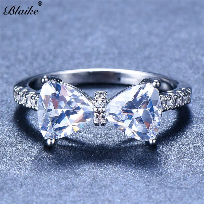 Blaike 925 Sterling Silver Filled Cubic Zirconia Bow Ring Cute White AAA Crystal Rings For Women Fashion Birthstone Jewelry Gift
Blaike 925 Sterling Silver Filled Cubic Zirconia Bow Ring Cute White AAA Crystal Rings For Women Fashion Birthstone Jewelry Gift
