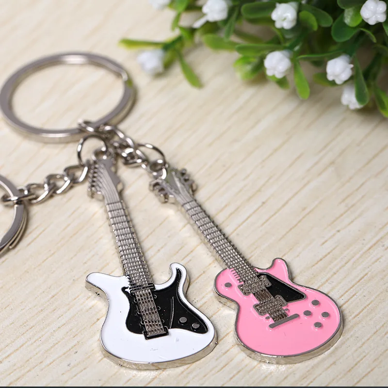 1lot=30pair!Small guitar alloy metal creative Couple keychains/Valentine's Day ,wedding gift/party Favors gift
1lot=30pair!Small guitar alloy metal creative Couple keychains/Valentine's Day ,wedding gift/party Favors gift