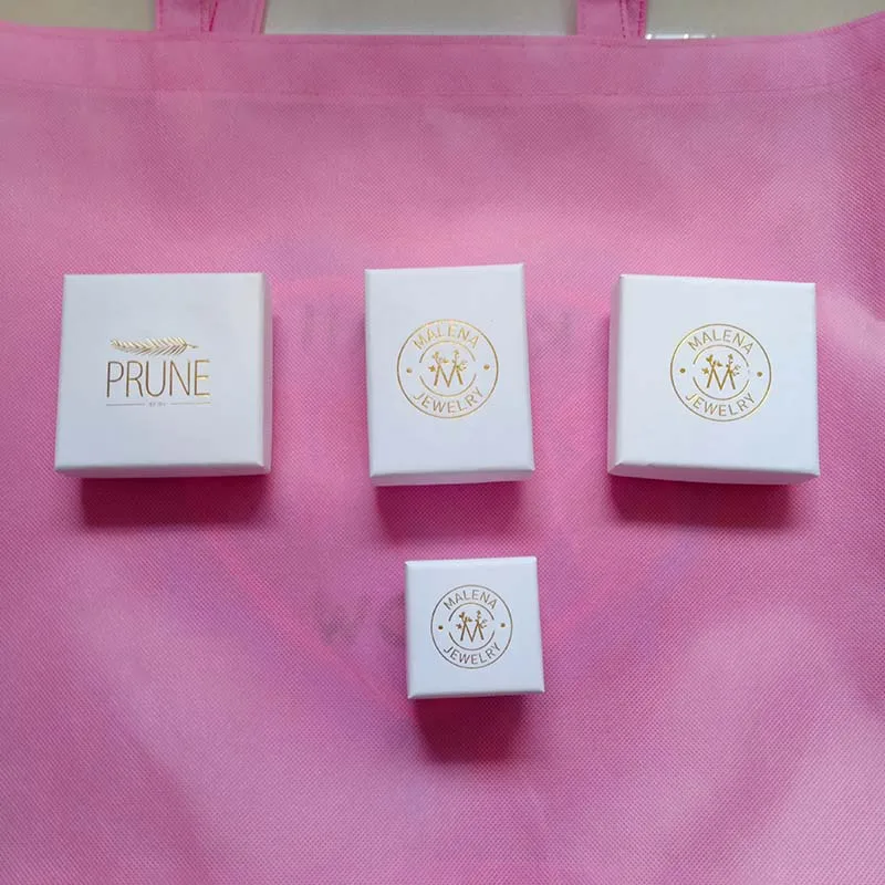 Wholesale 200pcs/lot White Jewelry gift boxes customized foil logo Packaging Earring Ring Necklace boxes With Velvet foam cuts
Wholesale 200pcs/lot White Jewelry gift boxes customized foil logo Packaging Earring Ring Necklace boxes With Velvet foam cuts