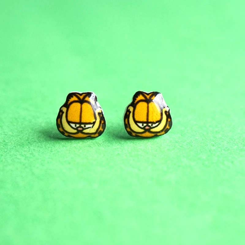 Trendy Handmade Garfield Cat American Cartoon Stud Earrings 925 Sterling Silver Ear Clip Magnet Earrings for Women Cool Jewelry 
Trendy Handmade Garfield Cat American Cartoon Stud Earrings 925 Sterling Silver Ear Clip Magnet Earrings for Women Cool Jewelry