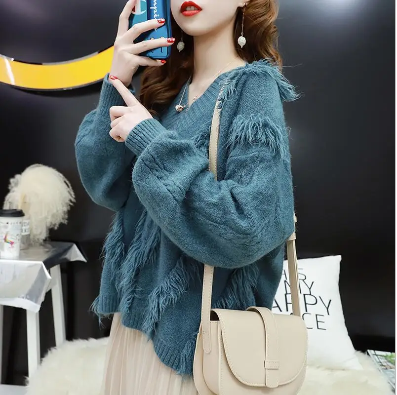 2019 Autumn Winter V Neck Women Sweaters And Pullovers Korean Tassel Long Sleeve Sweater Loose Knitted Warm Jumper 
2019 Autumn Winter V Neck Women Sweaters And Pullovers Korean Tassel Long Sleeve Sweater Loose Knitted Warm Jumper