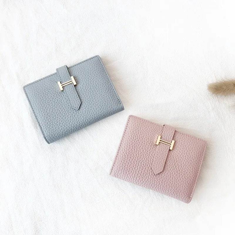 Genuine Leather womens wallets and purses Fashion Letter small wallet luxury design Short money bag Hasp Coin Pocket purse
Genuine Leather womens wallets and purses Fashion Letter small wallet luxury design Short money bag Hasp Coin Pocket purse