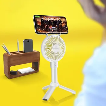Multi-function Mini Handheld Fan Tripod Mobile Phone Stand Vertical Portable Charging Cooling Fans Air Conditioner Cooler
Multi-function Mini Handheld Fan Tripod Mobile Phone Stand Vertical Portable Charging Cooling Fans Air Conditioner Cooler