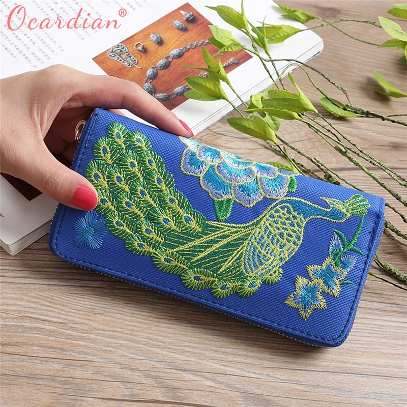 2018 Women Tanra National Wind Embroidery Peacock Wallet Card bag Preferential Dropship
2018 Women Tanra National Wind Embroidery Peacock Wallet Card bag Preferential Dropship