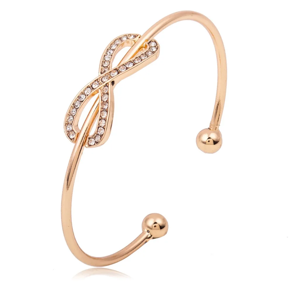 Korean version of the simple bangle bracelet 8 word rhinestone open alloy bangles Charm jewelry bangles for women
Korean version of the simple bangle bracelet 8 word rhinestone open alloy bangles Charm jewelry bangles for women