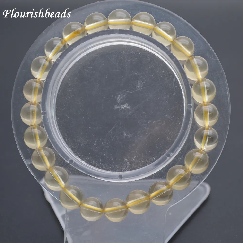 High Quality 8mm Natural Lemon Quartz Smooth Stone Round Beads Elastic Line Bracelets Fashion Woman Jewelry
High Quality 8mm Natural Lemon Quartz Smooth Stone Round Beads Elastic Line Bracelets Fashion Woman Jewelry