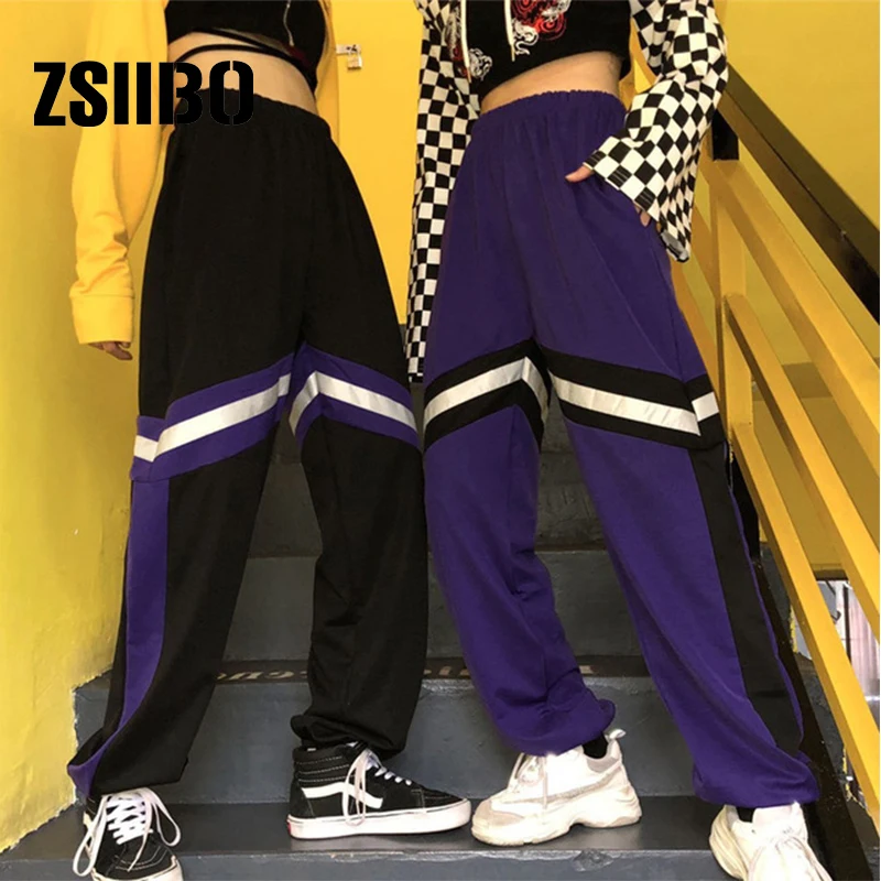 Korean version of Harajuku European and American fashion purple stitching reflective webbing sports beam hip hop women's pants
Korean version of Harajuku European and American fashion purple stitching reflective webbing sports beam hip hop women's pants