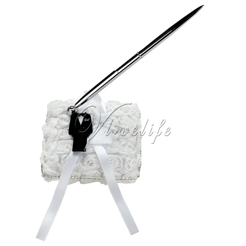 Bride and Groom Shape Pen and Pen Stand Set with White Lace Roses Flowers Ribbons Pen Holder for Wedding Party Home Decorations
Bride and Groom Shape Pen and Pen Stand Set with White Lace Roses Flowers Ribbons Pen Holder for Wedding Party Home Decorations