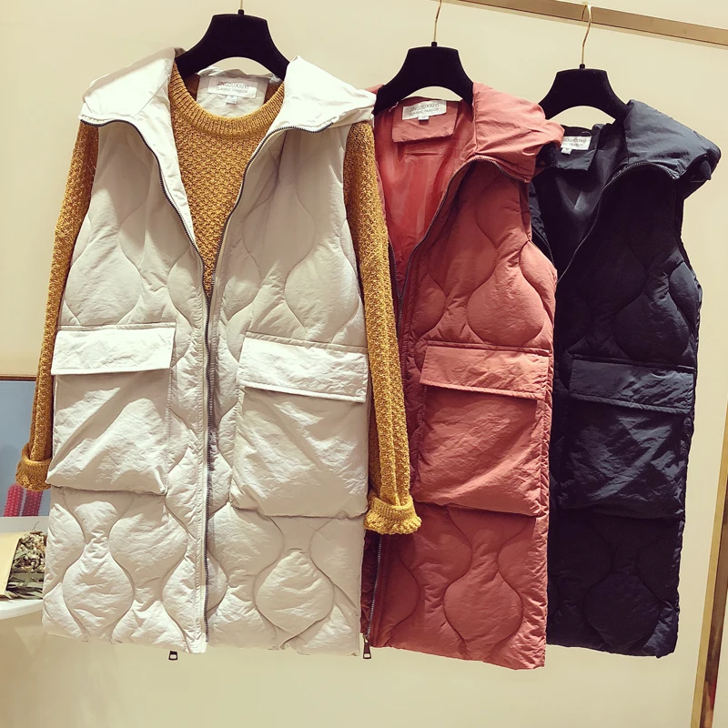 New Autumn Winter Jacket Women Long Down Vest Coat Hooded Warm Thick Sleeveless Waistcoat Female Cotton Padded Vest Parkas 1430
New Autumn Winter Jacket Women Long Down Vest Coat Hooded Warm Thick Sleeveless Waistcoat Female Cotton Padded Vest Parkas 1430